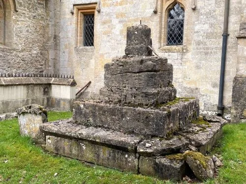Medieval cross base in the churchyard