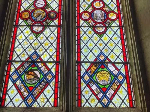 West window with medieval glass fragments