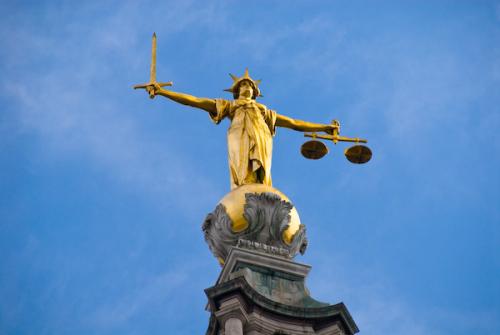 Figure of Justice atop the Old Bailey
