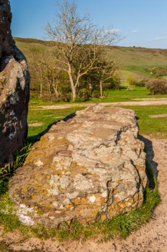 The smaller recumbent stone