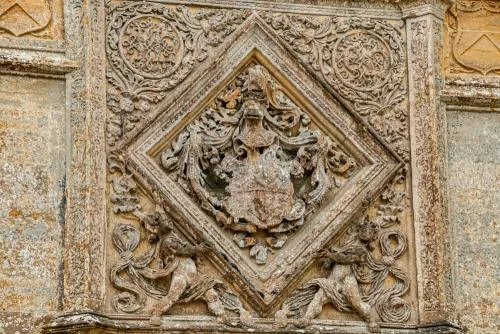 Coat of arms over the west door