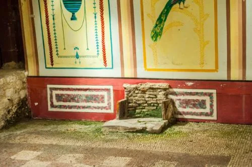 The fireplace in Room 5