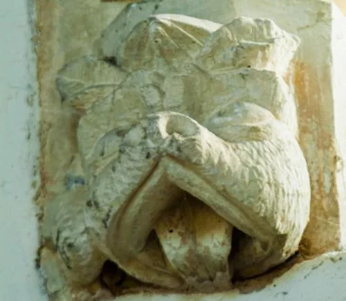 Grotesque medieval corbel head