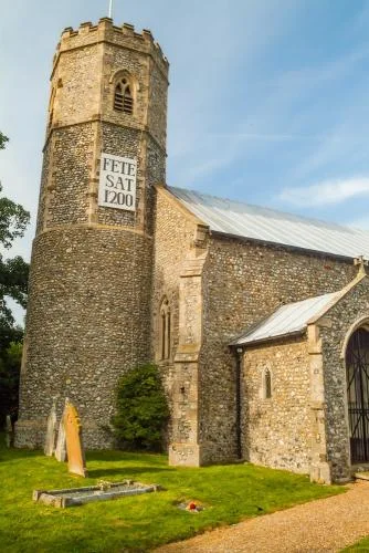 The round (base) and octagonal (top) tower