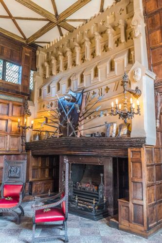 The ornate fireplace in the Tudor great hall