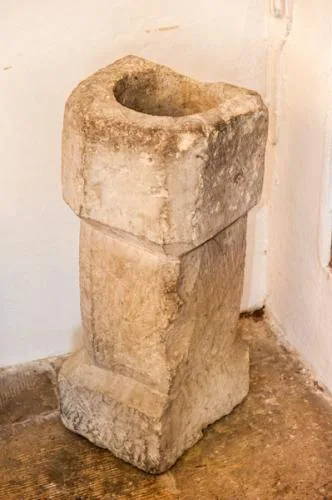 The medieval holy water stoup