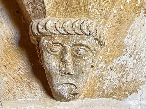 13th-century corbel head