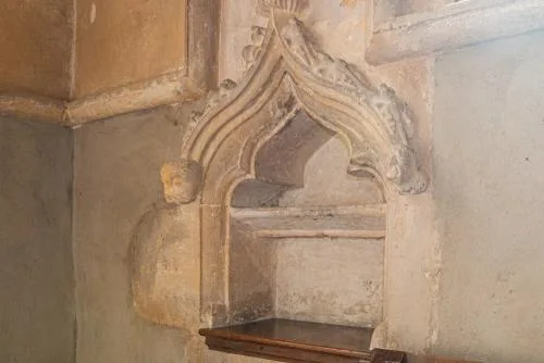 Medieval piscina in the chancel