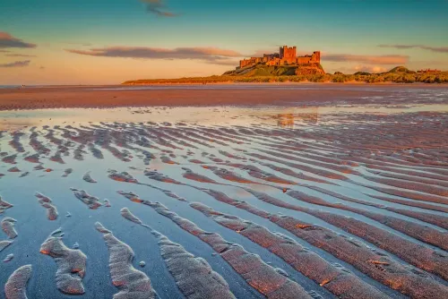 Bamburgh Castle at sunset