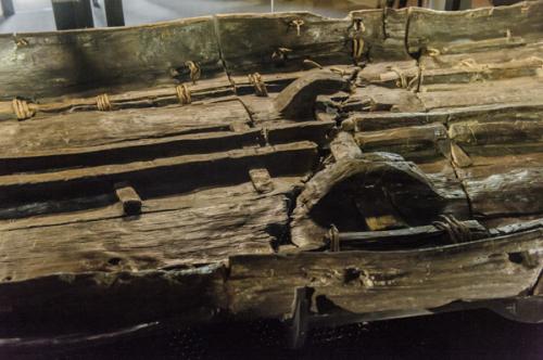 Bronze Age Boat side view, showing rounded cleats used to tie the timbers together