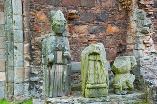 Larger than life statues of a bishop and knight in the nave