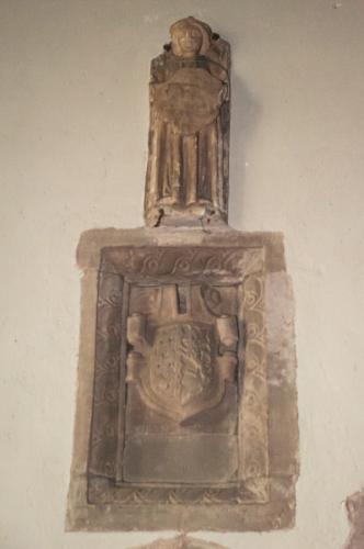 Carved figure of an angel and shield