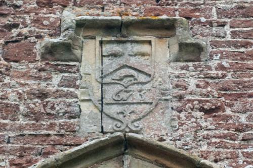 1673 coat of arms, east window