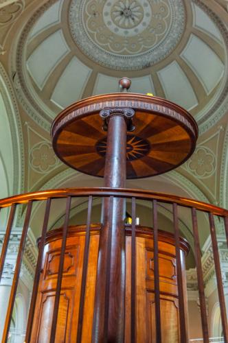 The cherry wood pulpit and sounding board