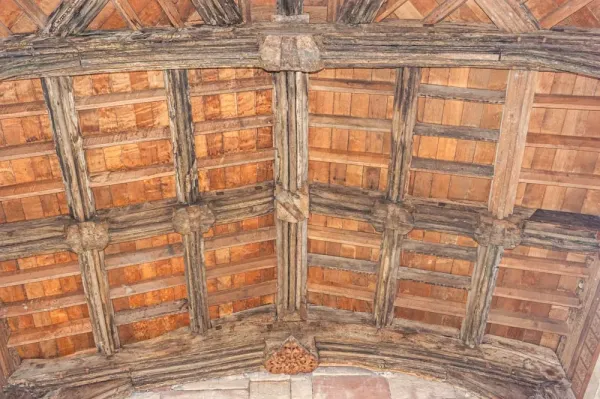 The chapel's timber roof and bosses