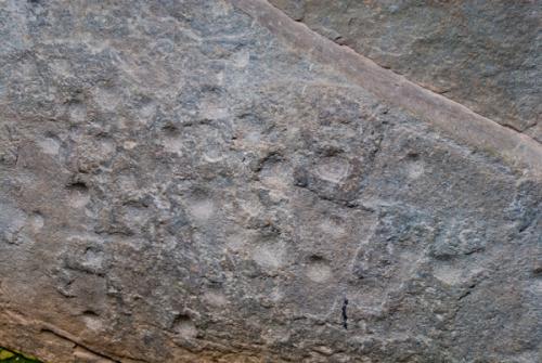 Cupmarks & axeheads on the capstone