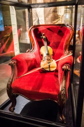 A chair and violin from the Conan Doyle Collection