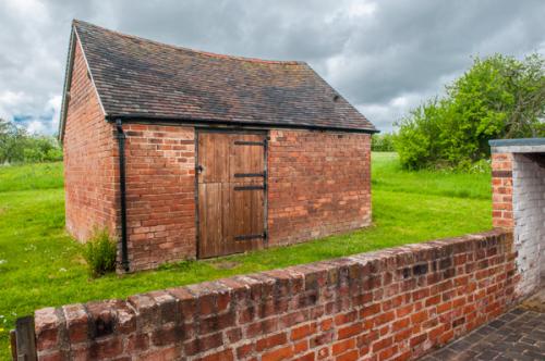 The Barn and orchard beyond
