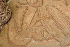 Lower left angel figure, tympaum