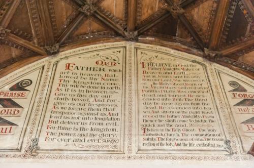 Georgian Biblical text over the chancel arch
