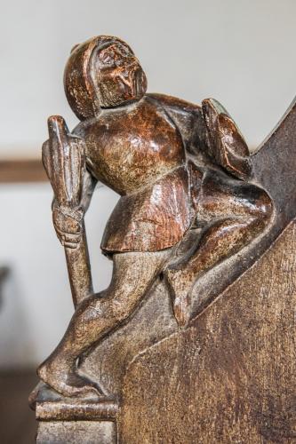 A medieval bench end