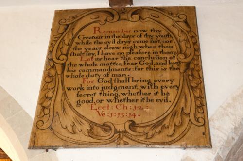 18th-century text board in the nave