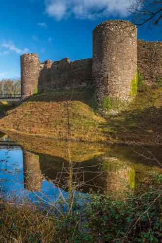 The castle reflected in the moat