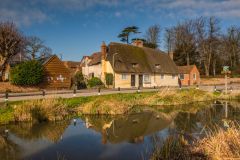 Thatched cottage and duck pond in Childrey