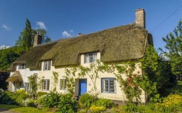 Thatched Cottage In Dunster, Somerset Prints