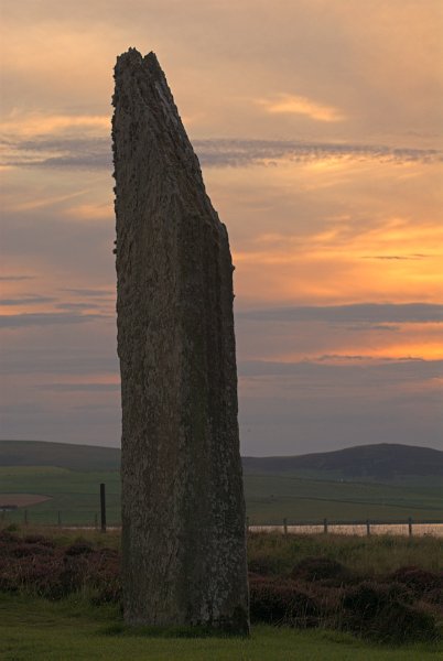 Sunset, looking west. The causewayed entrance to the circle is just to the right in this photo. Photo of the Ring of Brodgar, Orkney Mainland, Scotland.