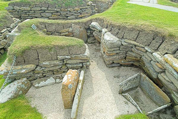 Here you can see how stone slabs were used to create partitions inside the huts. Photo of Skara Brae, a prehistoric village on the Orkney Islands, Scotland.
