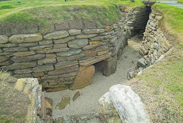 Here you get an idea of the height and width of the passage betwen houses at Skara Brae. Photo of Skara Brae, a prehistoric village on the Orkney Islands, Scotland.