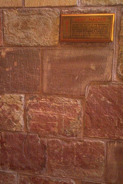 The bones of St Magnus the Martyr (died c.1116) are said to be buried within this pillar in the south aisle. Photo of St Magnus Cathedral, Kirkwall, Orkney Islands, Scotland.