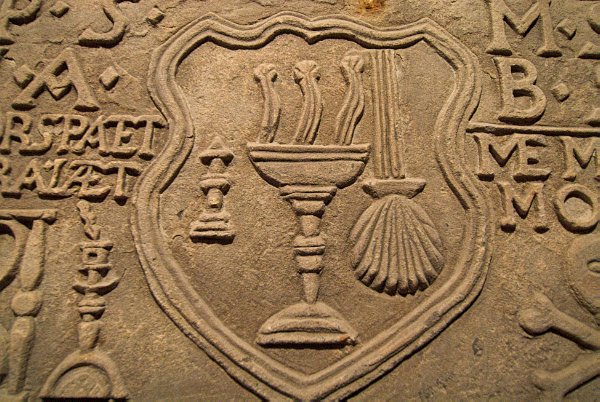 The south aisle is overflowing with 17th century stone memorial plaques like this one. Photo of St Magnus Cathedral, Kirkwall, Orkney Islands, Scotland.