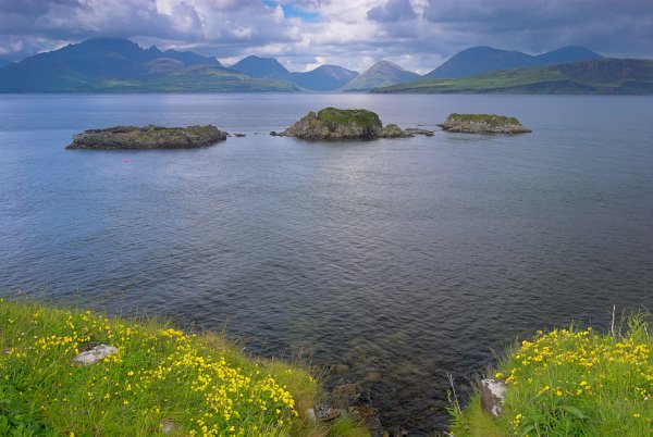 Photo of the Cuillin Hills taken from the ramparts of Dunscaith Castle on the Isle of Skye, Scotland. Part of the Britain Express Travel and Heritage Picture Library, Scotland collection.