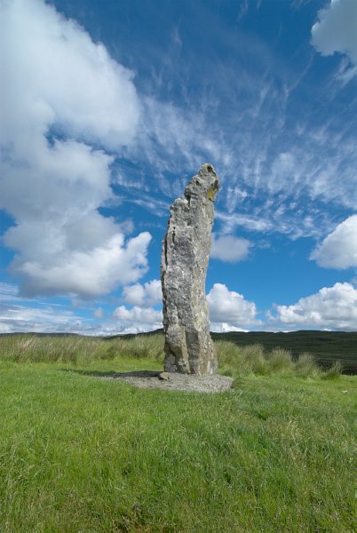 A standing stone on the hill above Dunvegan. This is a modern stone erected to mark the millennium. Stock photo of Dunvegan on the Isle of Skye, Scotland. Part of the Britain Express Travel and Heritage Picture Library, Scotland collection.