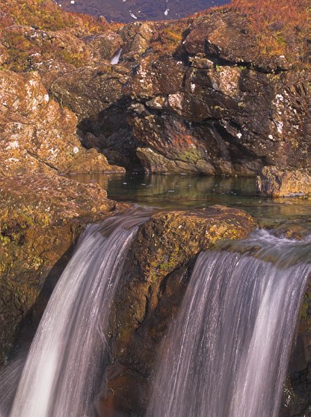 This cascade looks like fine strands of hair streaming down from the small pool. Stock photo of the Fairy Pools, Alt Coir' a' Mhadaidh, on the Isle of Skye, Scotland. Part of the Britain Express Travel and Heritage Picture Library, Scotland collection.