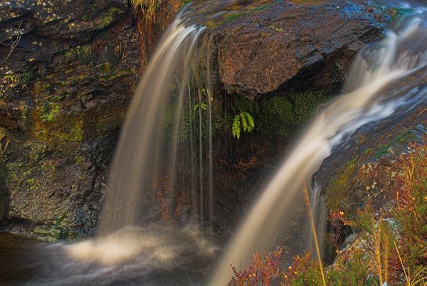 A tiny waterfall on Alt Coir' a' Mhadaidh, Glen Brittle. Stock photo of the Isle of Skye, Scotland. Part of the Britain Express Travel and Heritage Picture Library, Scotland collection.