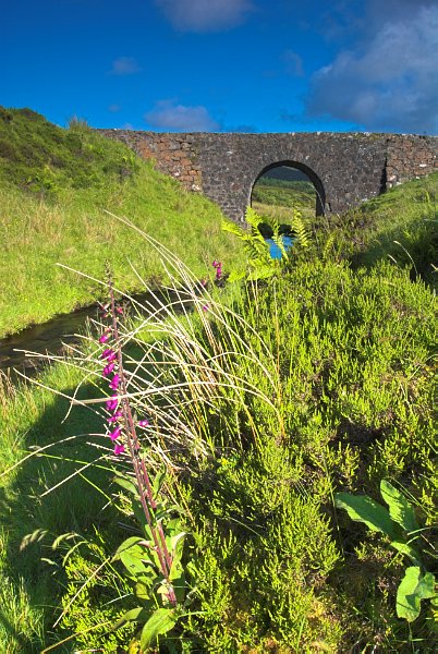 The Fairy Bridge, near Dunvegan. Legend tells that a Fairy Princess left her mortal husband at this spot. Stock photo of the Fairy Bridge on the Isle of Skye, Scotland. Part of the Britain Express Travel and Heritage Picture Library, Scotland collection.