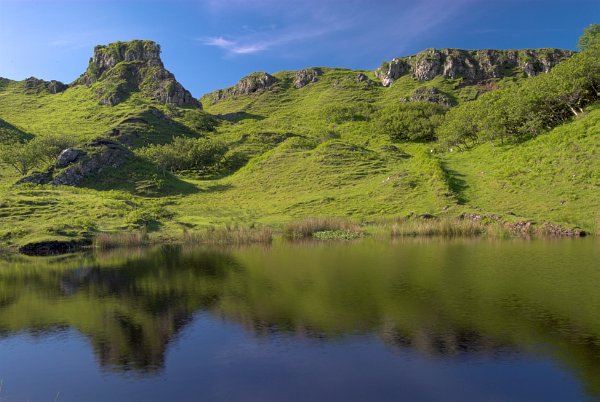 The Fairy Glen with Castle Ewen in the background. This is a magical, otherworldly place. Stock photo of The Fairy Glen near Uig on the Isle of Skye, Scotland. Part of the Britain Express Travel and Heritage Picture Library, Scotland collection.
