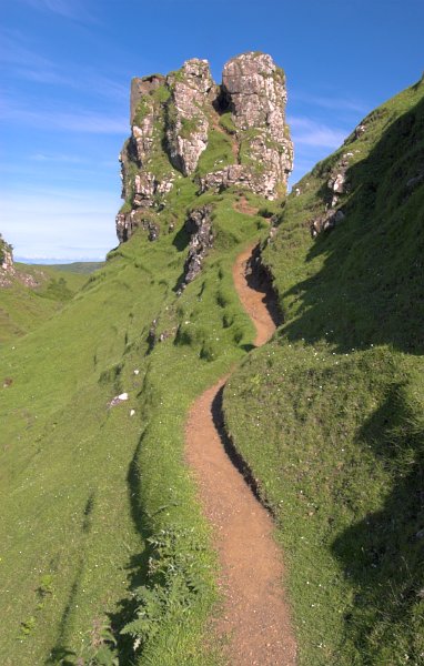 Castle Ewen, also known as the Fairy Castle, in the Fairy Glen. Though it looks like a fortified tower, Castle Ewen is a natural rock formation. Stock photo of Castle Ewen, the Fairy Glen, near Uig on the Isle of Skye, Scotland. Part of the Britain Express Travel and Heritage Picture Library, Scotland collection.