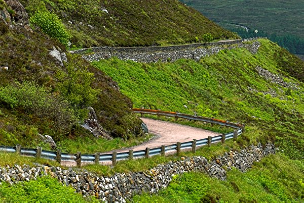 The road twists and winds along Glen Arroch to the ferry at Kylerhea. Stock photo of Glen Arroch on the Isle of Skye, Scotland. Part of the Britain Express Travel and Heritage Picture Library, Scotland collection.