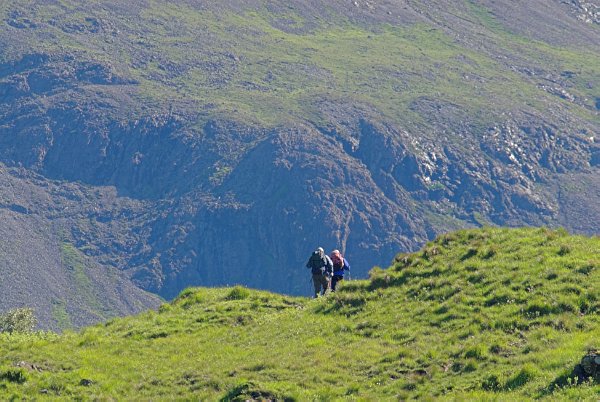 Walkers head towards the Cuillins at Glenbrittle. Stock photo of Glenbrittle on the Isle of Skye, Scotland. Part of the Britain Express Travel and Heritage Picture Library, Scotland collection.