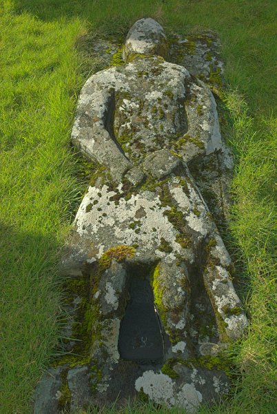 Knight's stone effigy at Kilmuir cemetery on the Trotternish peninsula. Stock photo of Kilmuir cemetary on the Isle of Skye, Scotland. Part of the Britain Express Travel and Heritage Picture Library, Scotland collection.