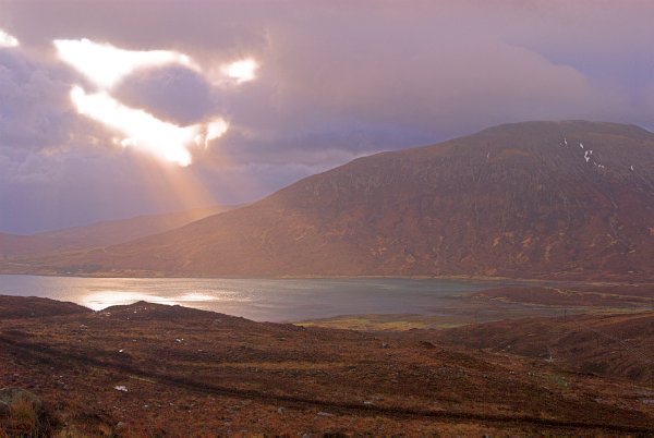 Loch Ainort; the sun breaks through after a morning shower. Stock photo of Loch Ainort on the Isle of Skye, Scotland. Part of the Britain Express Travel and Heritage Picture Library, Scotland collection.