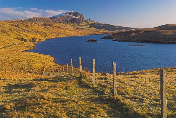 Loch Fada, with the Old Man of Storr in the distance. Stock photo of the Old Man of Storr on the Isle of Skye, Scotland. Part of the Britain Express Travel and Heritage Picture Library, Scotland collection.