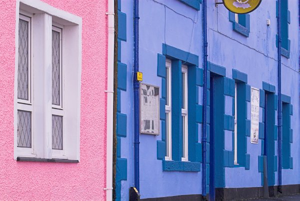 Colourful houses line the harbour front at Portree. Stock photo of Portree on the Isle of Skye, Scotland. Part of the Britain Express Travel and Heritage Picture Library, Scotland collection.