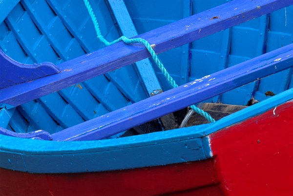 A colourful fishing boat in the harbour at Portree. Stock photo of Portree on the Isle of Skye, Scotland. Part of the Britain Express Travel and Heritage Picture Library, Scotland collection.