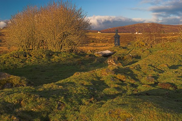 The ruined cemetary at Skeabost - located on an island in the middle of a river. Stock photo of the Isle of Skye, Scotland. Part of the Britain Express Travel and Heritage Picture Library, Scotland collection.