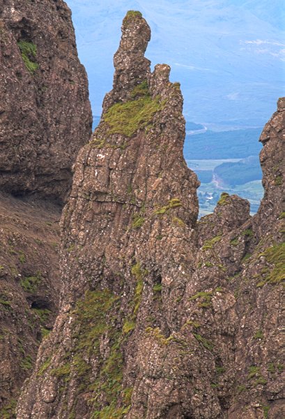 A rocky moss-clad pinnacle. Stock photo of Storr on the Isle of Skye, Scotland. Part of the Britain Express Travel and Heritage Picture Library, Scotland collection.